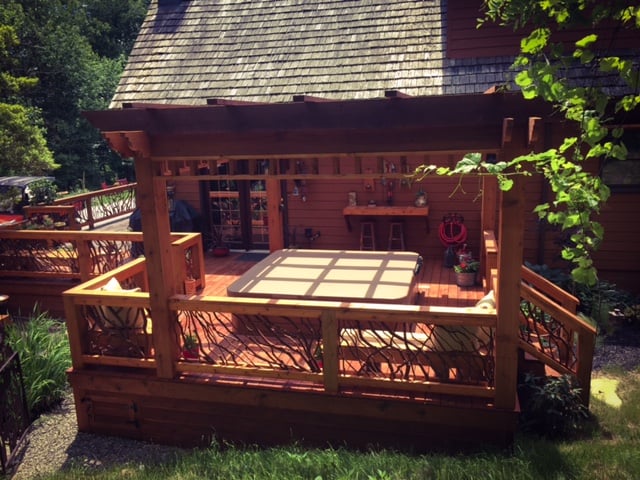Laurel railings hot tub pergola