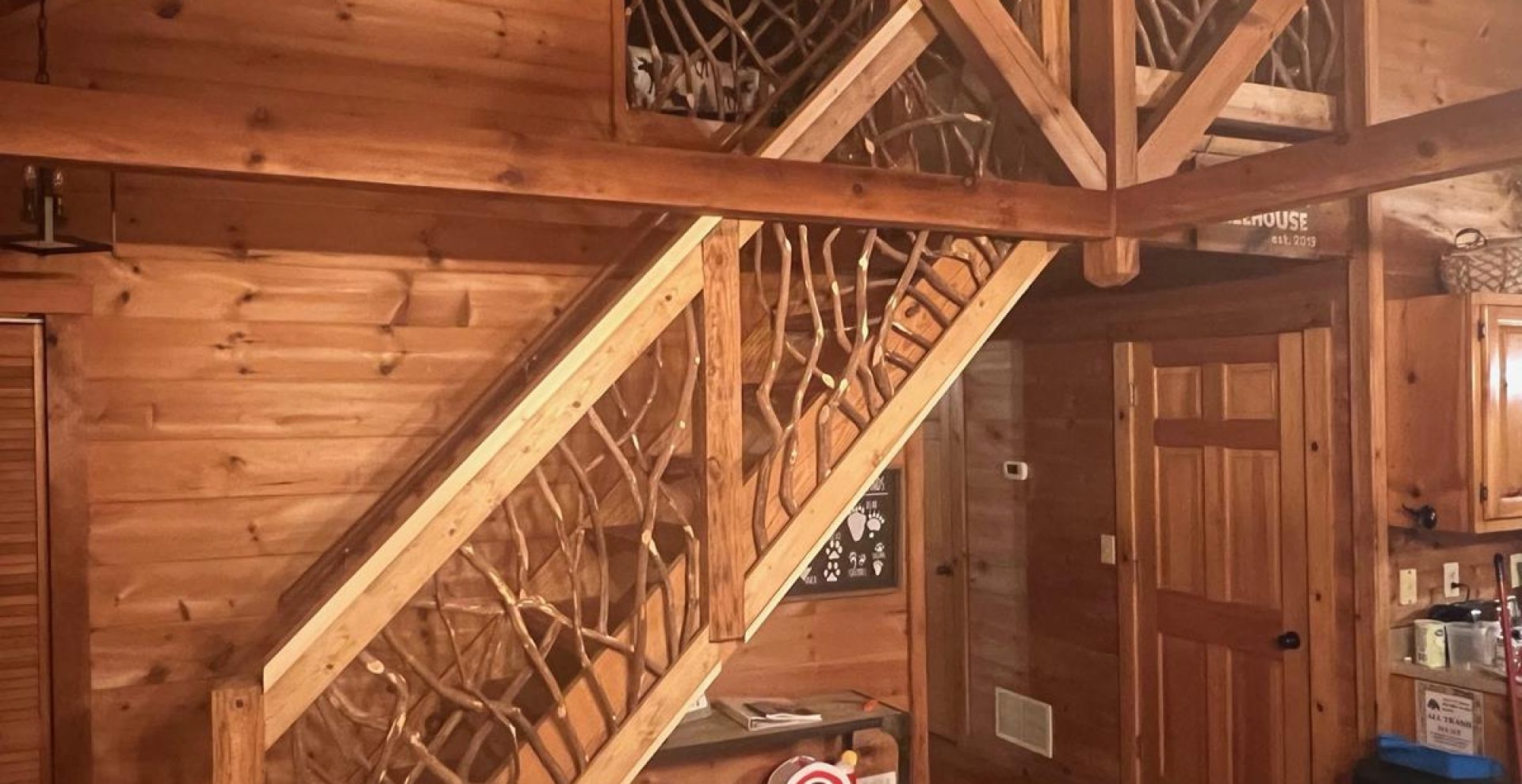 After view of stair handrails installed with mountain laurel handrails in Ellijay, GA, showcasing craftsmanship and design.