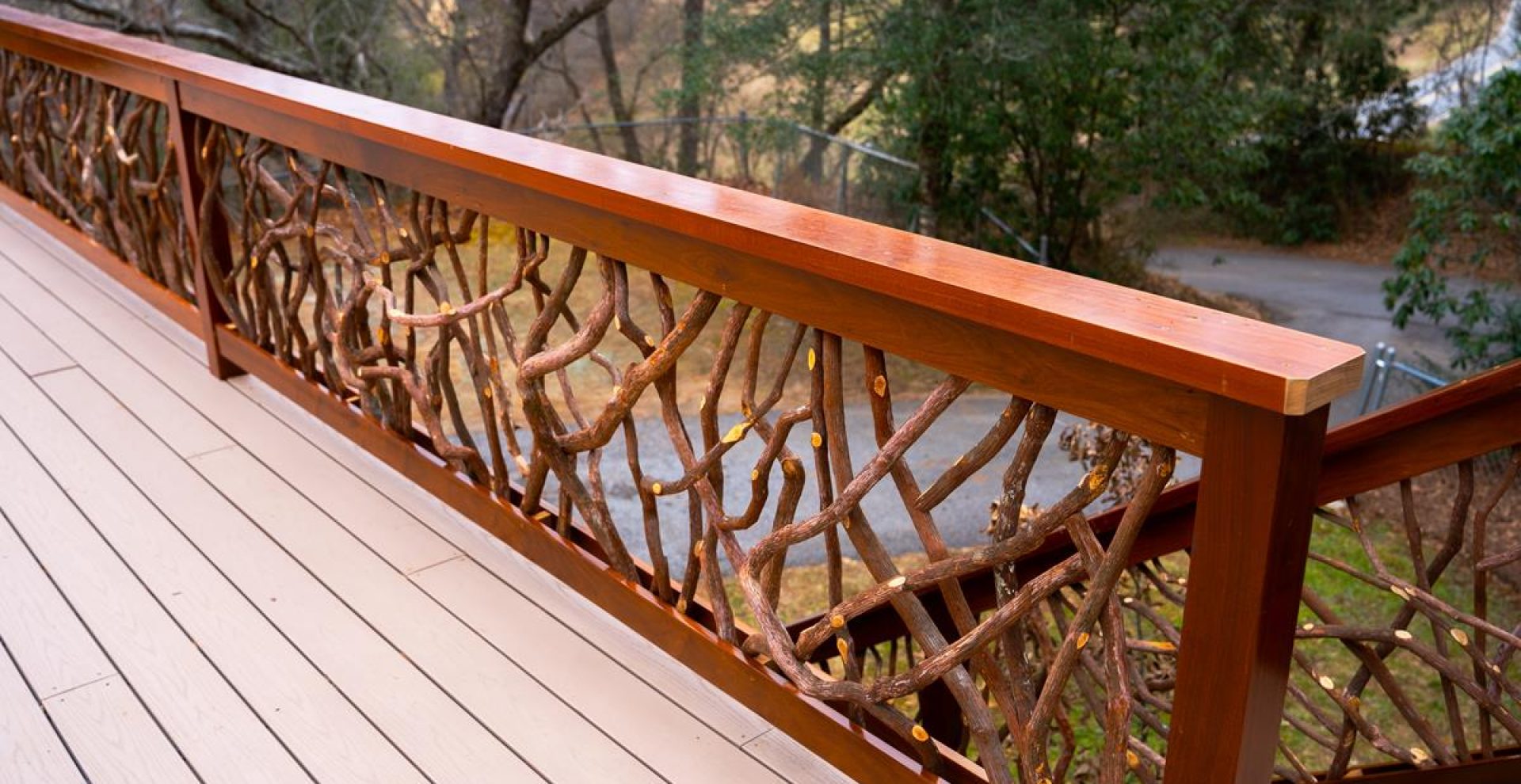Right side view of a deck featuring a mountain laurel handrail in Franklin, NC, showcasing natural beauty and craftsmanship.