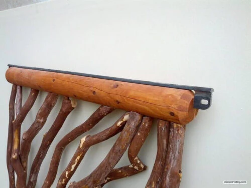 Detail Of Metal Brackets And Log Handrail