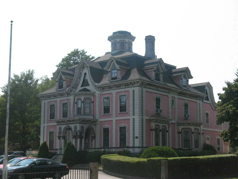Ornate Massachusetts home featuring a stunning widow's walk