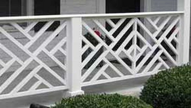 An elegant Chippendale handrail design showcasing a striking diagonal pattern that adds visual interest to a custom balcony railing, exemplifying refined outdoor aesthetics.