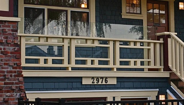 Craftsman style wood panels showcasing a spacious design that complies with building code requirements for 4-inch sphere safety exemplifying practical outdoor solutions.