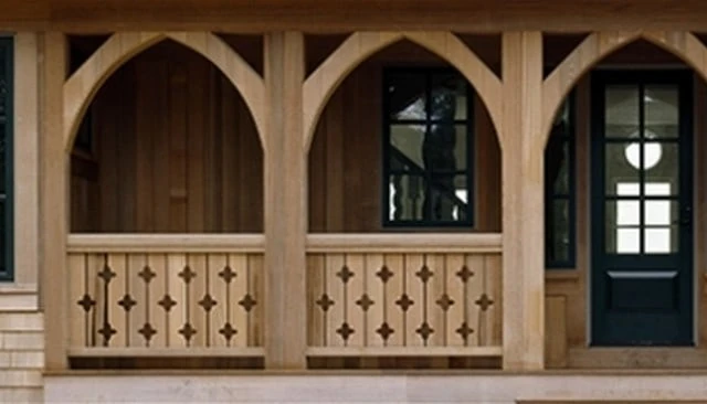 A wood railing design showcasing small crosses creating a diamond pattern with arched timber braces, exemplifying charming deck railing designs for front porches.