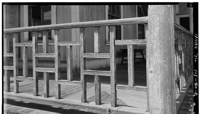 A historical detail showcasing affordable porch railing in Lahaina, Maui County, Hawaii, captured in a Library of Congress survey from 1933, highlighting traditional design elements.