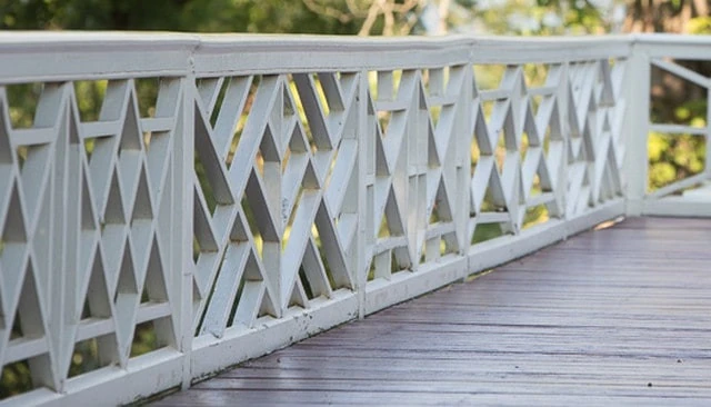 A historic Chippendale style handrail showcasing intricate deck railing designs inspired by the architectural details of Thomas Jefferson's Monticello estate.