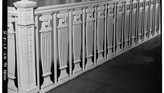 Extra-tall metal balusters featuring an Ionic Order-inspired design, originally created for the historic Morosco Theater in New York City