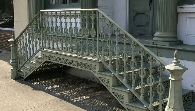 An elevated stairs architectural relic featuring a simple design that allows easy exit from horse-drawn carriages without dirtying feet