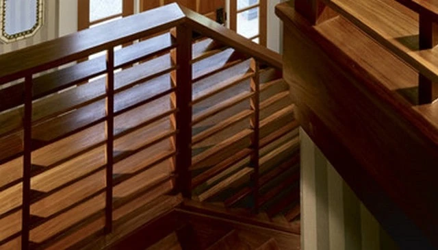 A distinctive deck railing design featuring 1x6 horizontal boards that emphasize elegant simplicity with clean lines for enhanced sightlines