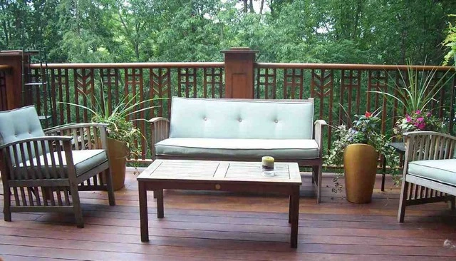 A stunning deck railing design featuring Prairie Style Ipe showcasing a unique take on Craftsman woodwork with intricate yet simple elements