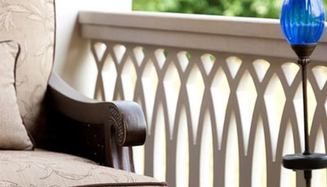 Curved oval balustrade design featuring tightly spaced patterns, creating a unique aesthetic for deck railing design.