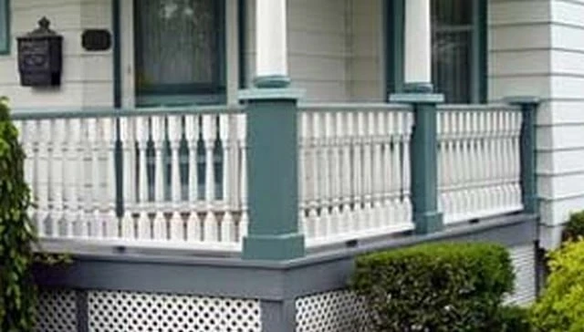 Simplistic turned balusters featuring minimal fluting with extended square bases and tops, ideal for understated home design in deck railing applications.