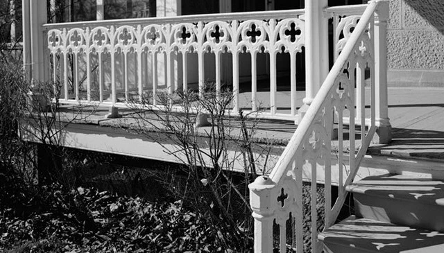 Historic photograph of Washington DC Soldiers Home showcasing vertical metal balusters with alternate cross and arrow motifs, ideal for unique deck railing designs.