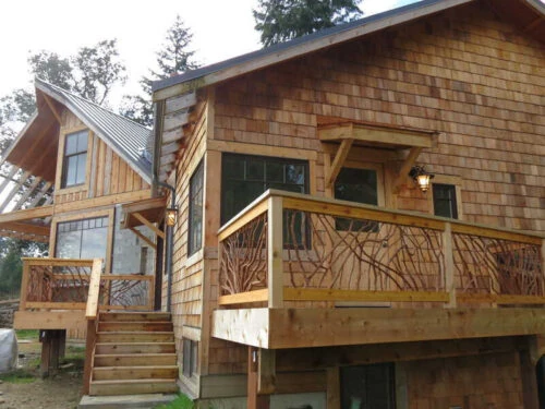 Kingston, WA Exterior Wood Home Double Balcony Wood Railing
