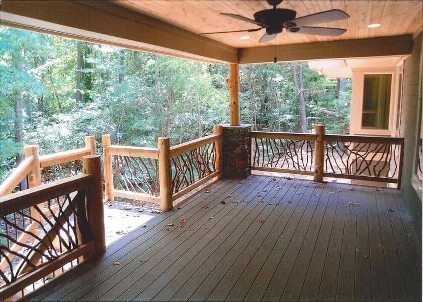 Stylish cedar deck railing posts adorned with mountain laurel branches, showcasing a blend of elegance and natural beauty.