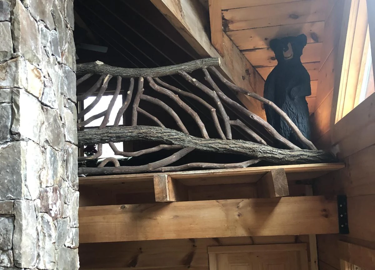 Exquisite woodwork featuring curved locust and laurel branches, showcasing fine craftsmanship for elegant home decor.