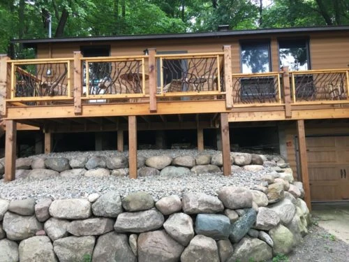 Stone Landscaping And Wood Siding