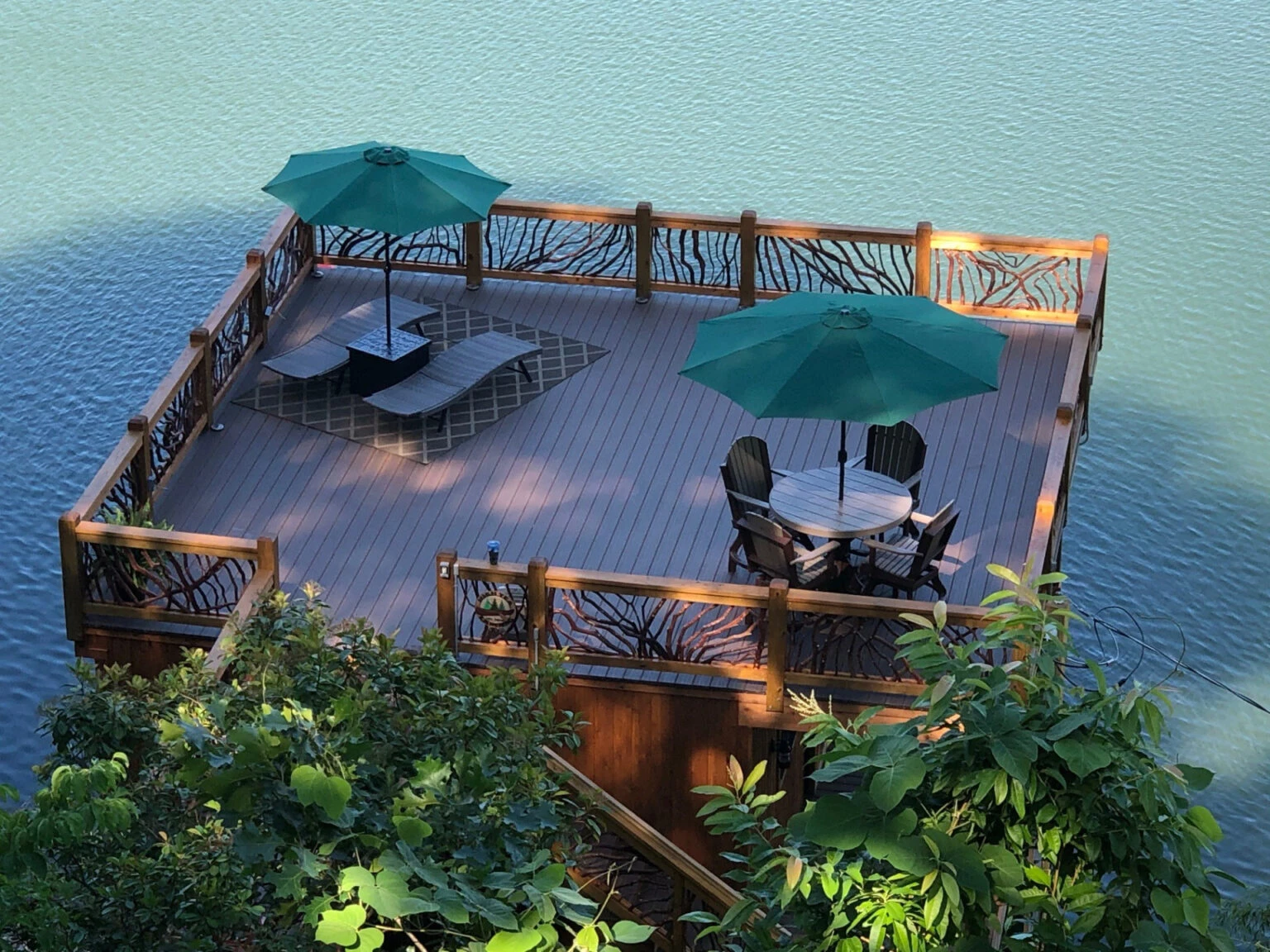 Shadowed lake Dock With Mountain Laurel Handrails