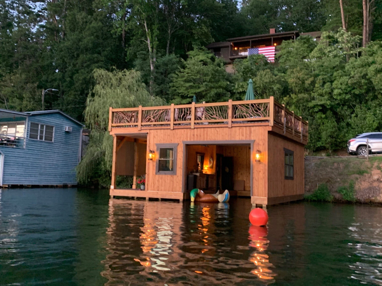 Far Water View Of Dock Home With Mountain Laurel Handrails