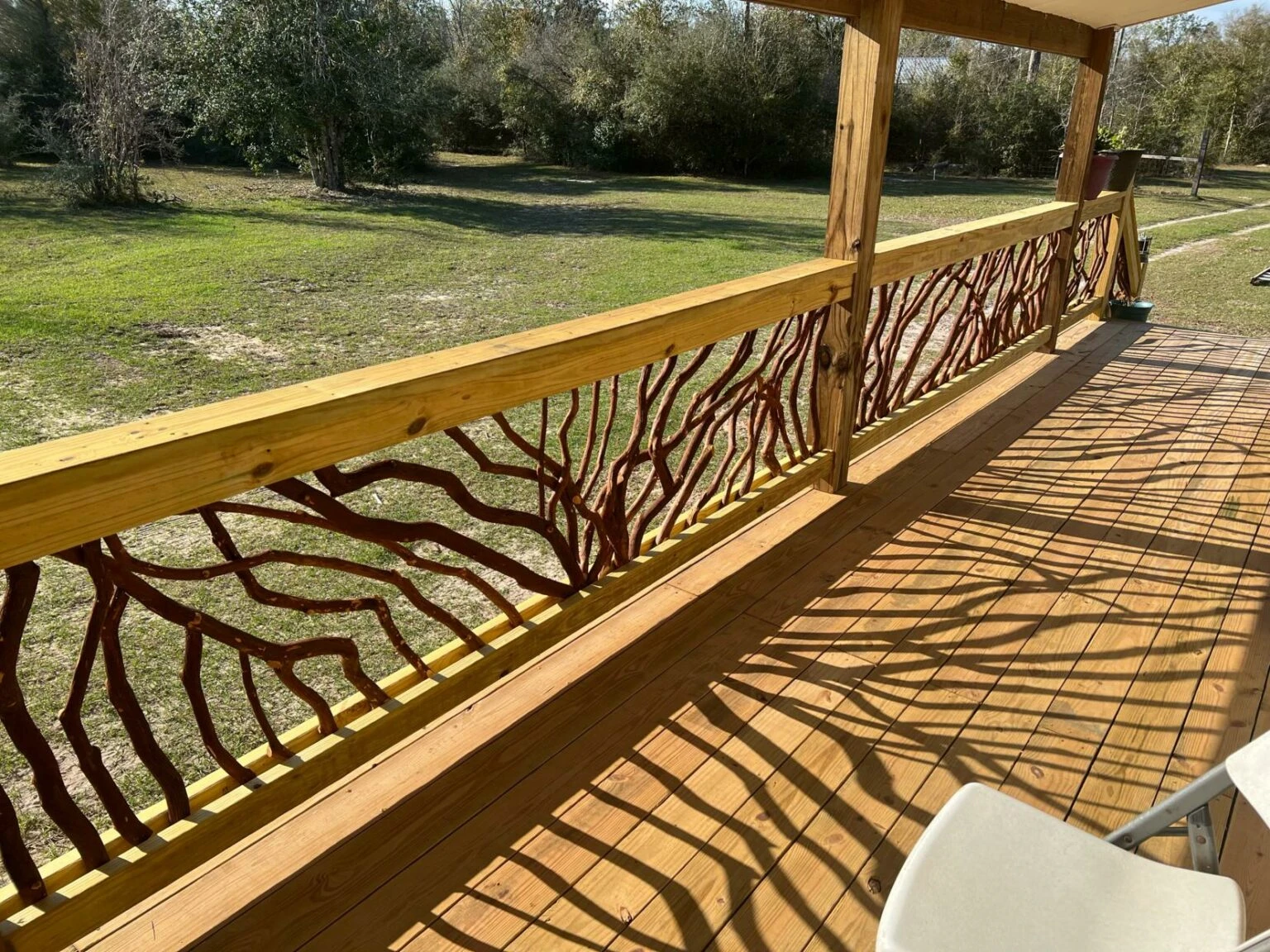 Fountain, FL Sunlight On The Porch Handrail Shadow
