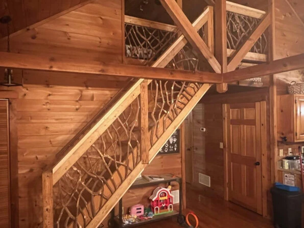 After view of stair handrails installed with mountain laurel handrails in Ellijay, GA, showcasing craftsmanship and design.